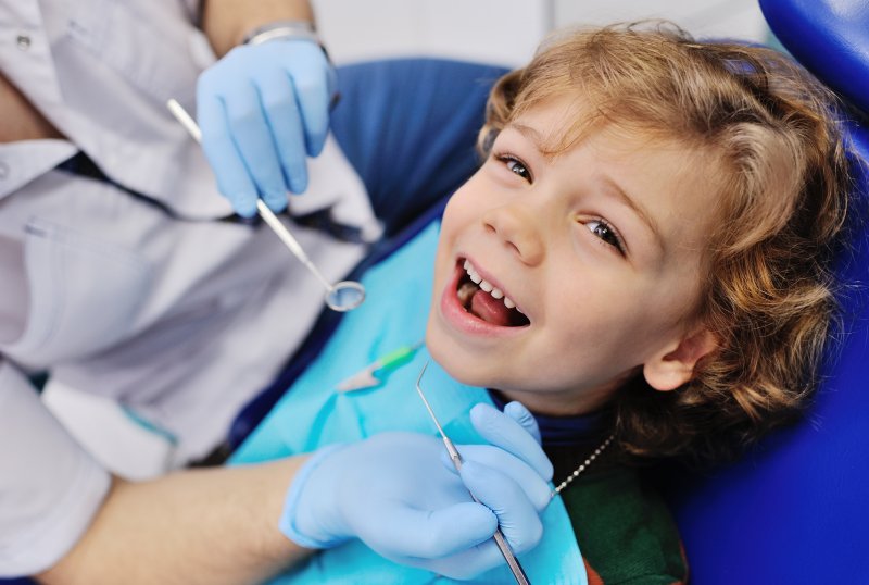 child undergoing a dental exam